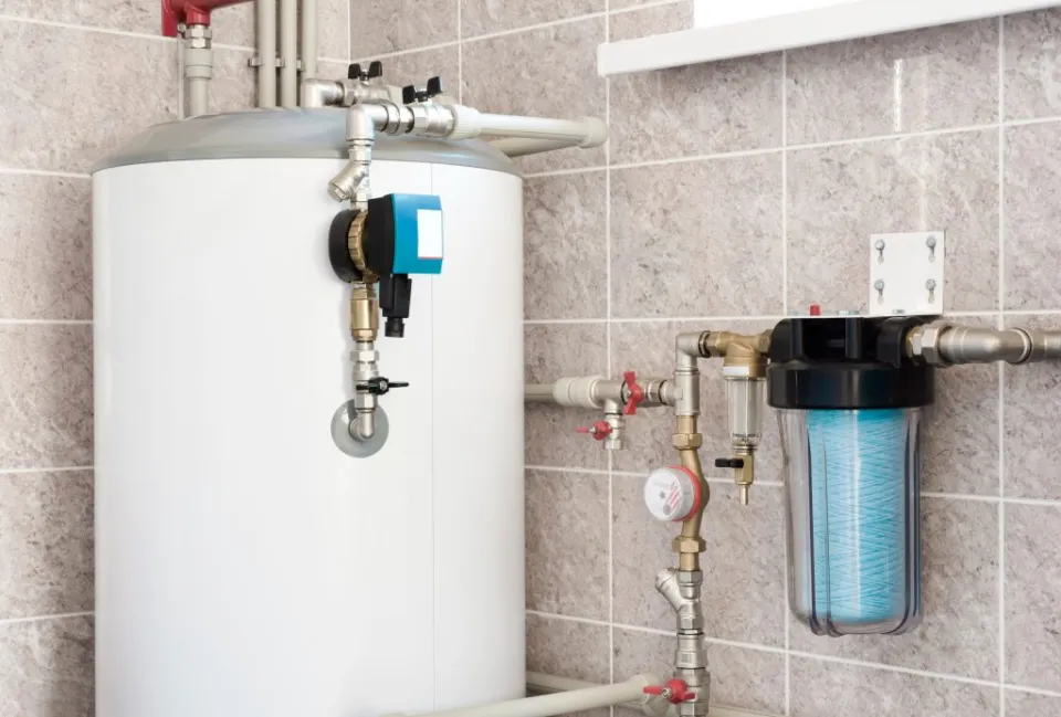 Residential water heater with connected supply and filtration lines