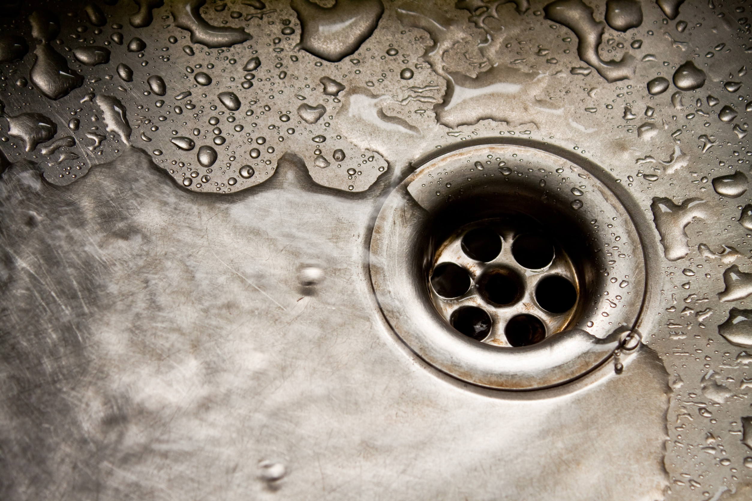 Blue Moon Plumbing performing drain cleaning in Dallas