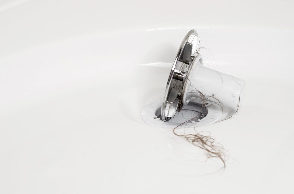 how to fix slow drain in bathtub