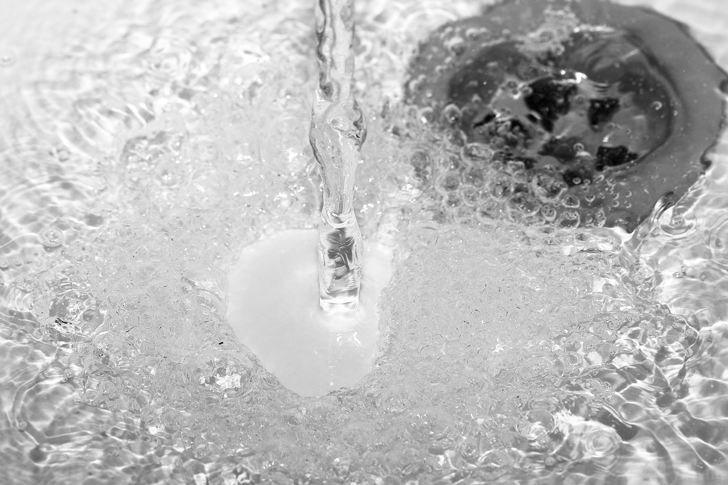 How to Clear a Clogged Drain with Standing Water