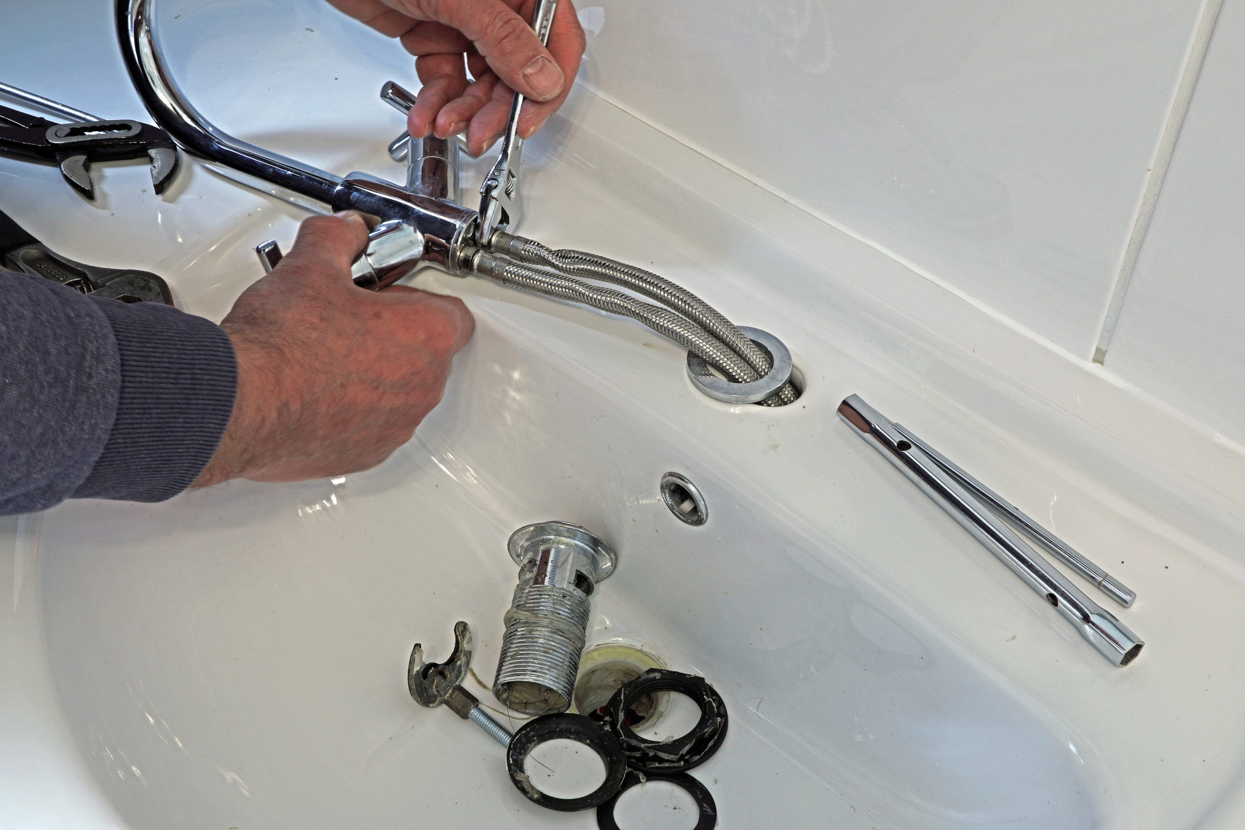 install faucet in bathroom sink